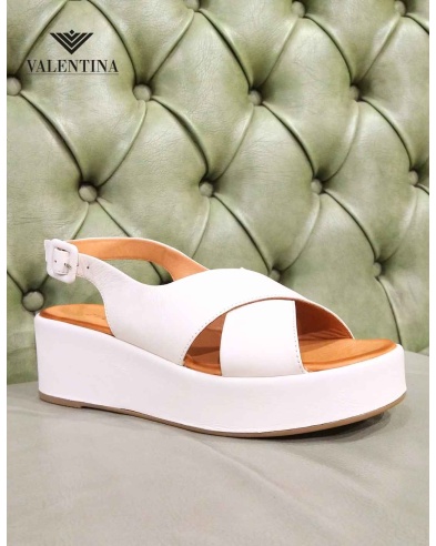 Sandali slingabck con zeppa in pelle. Marca Evoca